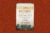 Book cover: “The Cancer Factory: Industrial chemicals, corporate deception and the hidden deaths of American workers” by Jim Morris. The cook over is a historic photo of a factory that is worn and faded. The main text is yellow and orange. Secondary text is black. The cover is on a dark orange speckled background.