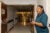 Joann Wilson stands near the doorway of an empty hospital hallway at the closed Patients' Choice Medical Center.